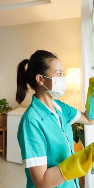 woman-from-cleaning-service-wash-windows